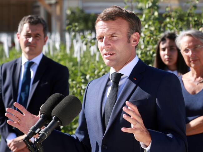 Emmanuel Macron y Gerald Darmanin