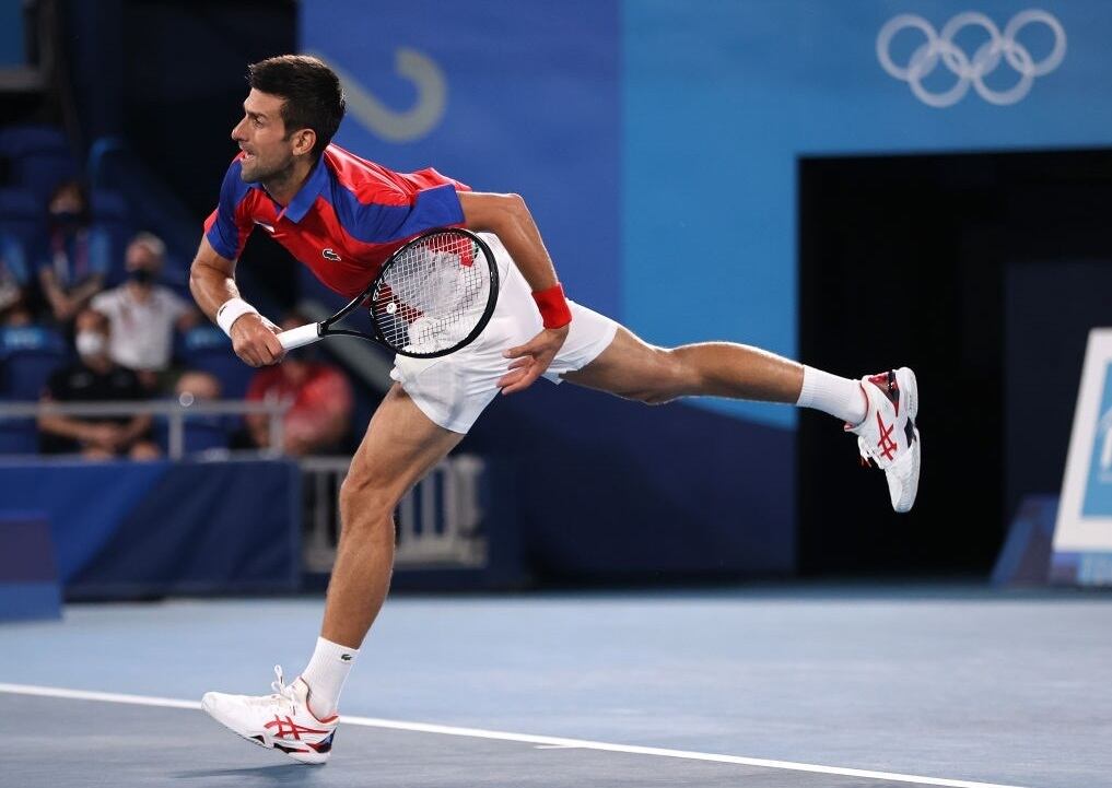 TOKYO, JAPAN - JULY 29: Novak Djokovic of Team Serbia serves during his Men's Singles Quarterfinal match against Kei Nishikori of Team Japan on day six of the Tokyo 2020 Olympic Games at Ariake Tennis Park on July 29, 2021 in Tokyo, Japan. (Photo by Clive Brunskill/Getty Images)