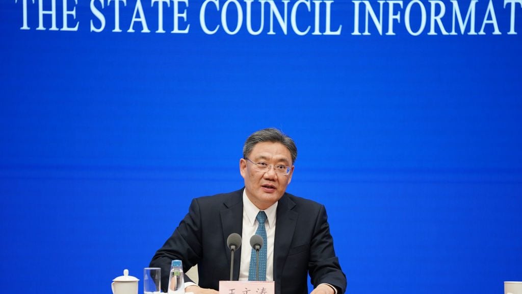 BEIJING, CHINA - FEBRUARY 24: China's Minister of Commerce Wang Wentao attends a news conference of the State Council Information Office on trade industry development on February 24, 2021 in Beijing, China. (Photo by VCG/VCG via Getty Images)