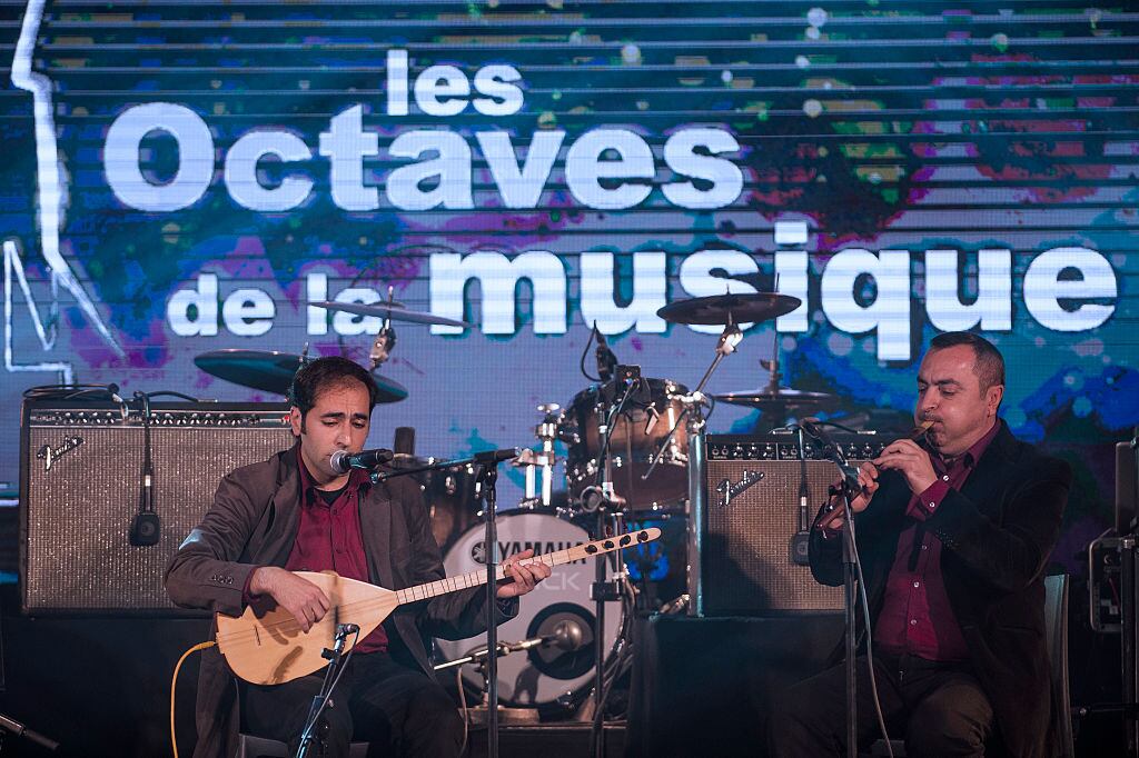 Armenian artist Vardan Hovanissian performs with Turkish-Belgian artist Emre Gultekin during the 13th edition of the "Les Octaves de la Musique" music awards ceremony at the Madelaine in Brussels on March 21, 2016. / AFP / BELGA / LAURIE DIEFFEMBACQ / Belgium OUT (Photo credit should read LAURIE DIEFFEMBACQ/AFP via Getty Images)