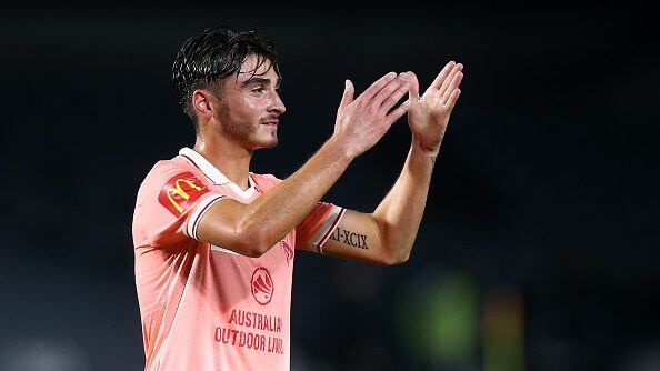 GOSFORD, AUSTRALIA - MARCH 26: Joshua Cavallo of United acknowledges fans following the A-League Mens match between Central Coast Mariners and Adelaide United at Central Coast Stadium on March 26, 2022 in Gosford, Australia. (Photo by Jason McCawley/Getty Images)