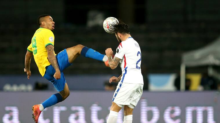 RIO DE JANEIRO, BRAZIL - JULY 02: Gabriel Jesus of Brazil competes for the ball with Eugenio Mena of Chile ,during the Quarterfinal match between Brazil and Chile as part of Conmebol Copa America Brazil 2021 at Estadio Olímpico Nilton Santos on July 2, 2021 in Rio de Janeiro, Brazil. (Photo by MB Media/Getty Images)