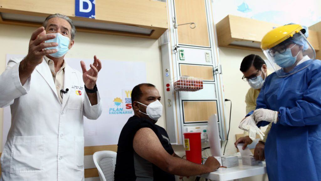 GUAYAQUIL, ECUADOR - JANUARY 21: Juan Carlos Zevallos López, Minister of Public Health of Ecuador explains the vaccination process as part of the first stage of Ecuador's COVID-19 vaccination plan at Guasmo Sur Hospital on January 21, 2021 in Guayaquil, Ecuador. Guayaquil and Quito, the hardest hit cities by the pandemic, received the first dose of the Pfizer/BioNTech vaccine. This phase is focused on the medical personnel of some hospitals and older adults in geriatric centers. (Photo by Gerardo Menoscal/Agencia Press South/Getty Images)