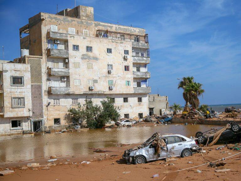 DERNA, LIBYA - SEPTEMBER 17: A view of devastation as search and rescue operation teams from various countries, especially Turkiye, continue their efforts after the floods caused by the Storm Daniel ravaged the region, in Derna, Libya on September 17, 2023. At least 11,300 people have been killed and thousands more are still missing following the floods caused by Mediterranean storm Daniel, according to the UN Humanitarian Office (OCHA); more than 40,000 people have been displaced across Libya's northeastern areas by the deadly floods, the UN office said. (Photo by Halil Fidan/Anadolu Agency via Getty Images)