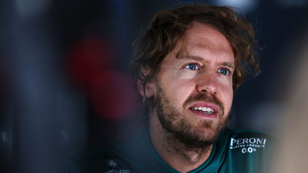 SPIELBERG, AUSTRIA - JULY 07: Sebastian Vettel of Germany and Aston Martin F1 Team talks to the media in the Paddock during previews ahead of the F1 Grand Prix of Austria at Red Bull Ring on July 07, 2022 in Spielberg, Austria. (Photo by Bryn Lennon/Getty Images)