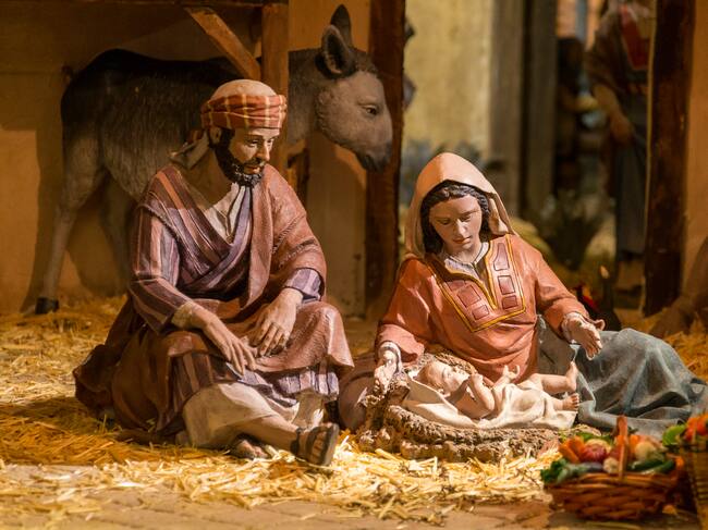Figures in Bethlehem at Christmas, December.
