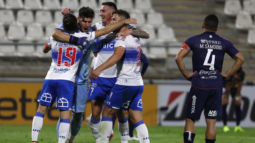 SANTIAGO, CHILE - NOVEMBER 05: José Pedro Fuenzalida, goalkeeper Matías Dituro, Tomás Astaburuaga and Germán Lanaro of Universidad Catolica celebrate after winning a second leg match of the second round of Copa CONMEBOL Sudamericana 2020 between Universidad Católica and Sol de América at Estadio San Carlos de Apoquindo on November 05, 2020 in Santiago, Chile. (Photo by Esteban Felix - Pool/Getty Images)
