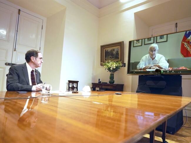 La reunión telemática del Presidente Piñera con el ministro de Justicia, Hernán Larraín. Foto: Prensa Presidencia
