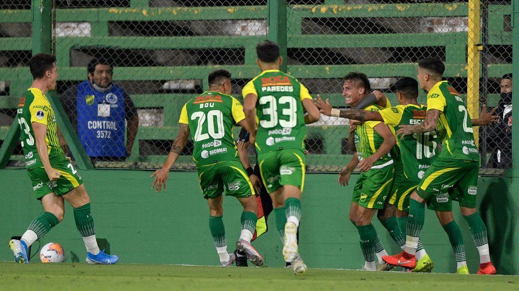 FLORENCIO VARELA, ARGENTINA - DECEMBER 16: Braian Romero of Defensa y Justicia celebrates with teammates after scoring the first goal of his team during a quarter final second leg match between Defensa y Justicia and Bahia as part of Copa CONMEBOL Sudamericana 2020 at Estadio Norberto Tomaghello on December 16, 2020 in Florencio Varela, Argentina. (Photo by Juan Mabromata - Pool/Getty Images)