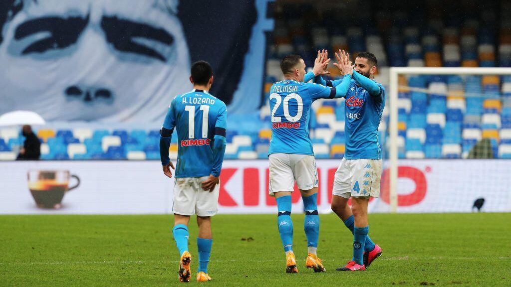 NAPLES, ITALY - JANUARY 17: Piotr Zielinski of S.S.C. Napoli celebrates with Diego Demme after scoring their team's fourth goal during the Serie A match between SSC Napoli and ACF Fiorentina at Stadio Diego Armando Maradona on January 17, 2021 in Naples, Italy. Sporting stadiums around Italy remain under strict restrictions due to the Coronavirus Pandemic as Government social distancing laws prohibit fans inside venues resulting in games being played behind closed doors. (Photo by Francesco Pecoraro/Getty Images)