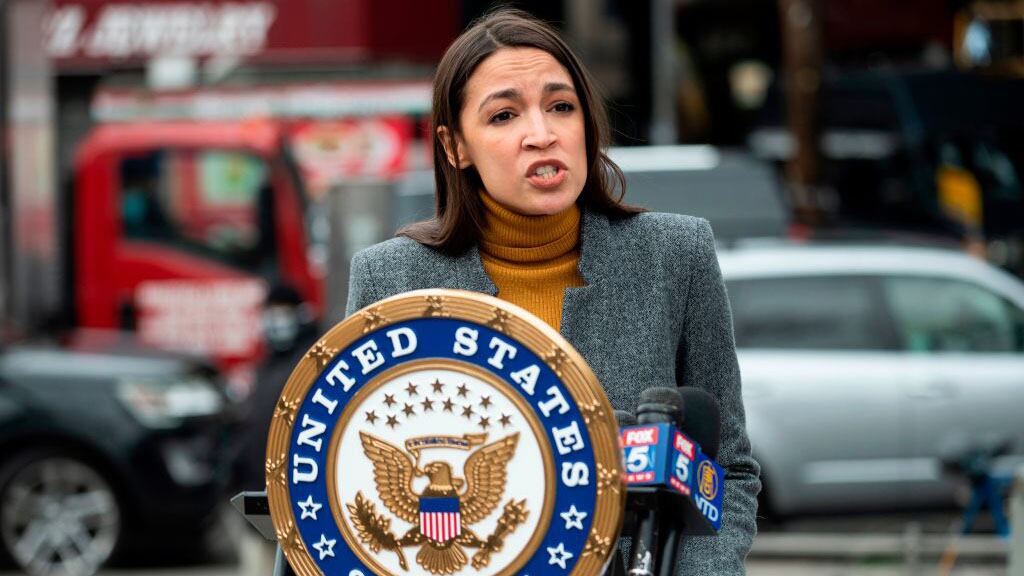 Democratic Congresswoman from New York Alexandria Ocasio-Cortez speaks during a press conference in the Corona neighbourhood of Queens on April 14, 2020 in New York City. - Senate Minority Leader Chuck Schumer and Democratic Rep. Alexandria Ocasio-Cortez hold a press conference amid the coronavirus pandemic to call on the Federal Emergency Management Administration (FEMA) to begin approving disaster funds to help families in lower-income communities and communities of color pay for funeral costs. (Photo by Johannes EISELE / AFP) (Photo by JOHANNES EISELE/AFP via Getty Images)