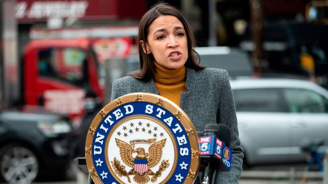 Democratic Congresswoman from New York Alexandria Ocasio-Cortez speaks during a press conference in the Corona neighbourhood of Queens on April 14, 2020 in New York City. - Senate Minority Leader Chuck Schumer and Democratic Rep. Alexandria Ocasio-Cortez hold a press conference amid the coronavirus pandemic to call on the Federal Emergency Management Administration (FEMA) to begin approving disaster funds to help families in lower-income communities and communities of color pay for funeral costs. (Photo by Johannes EISELE / AFP) (Photo by JOHANNES EISELE/AFP via Getty Images)