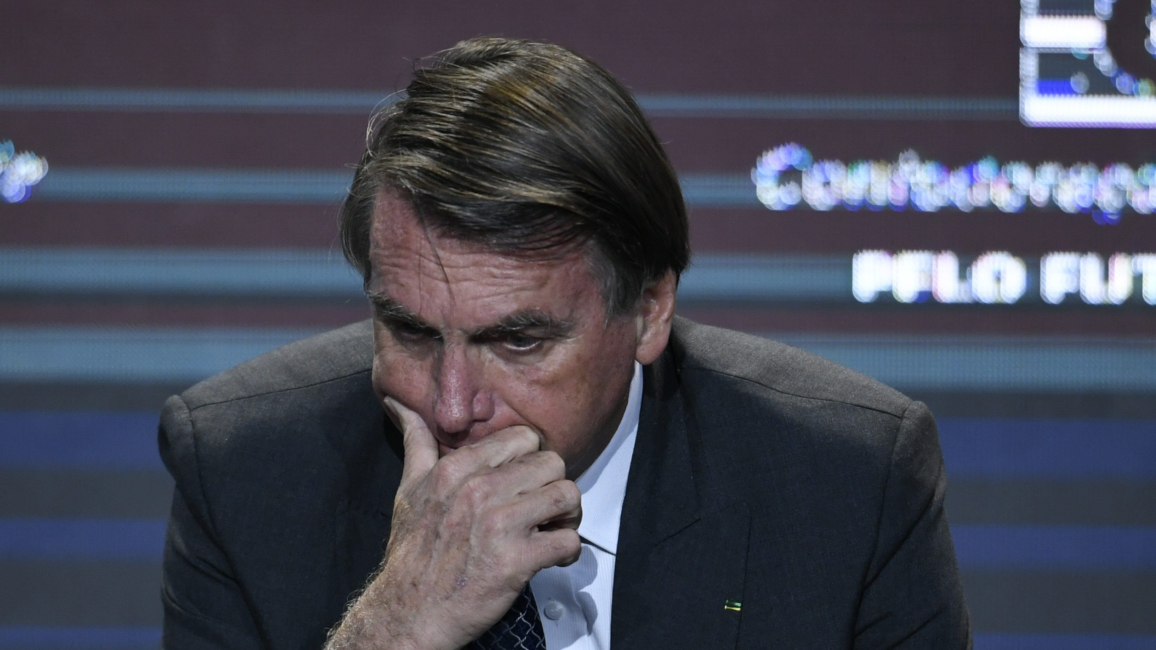 BRASILIA, BRAZIL - DECEMBER 07: President of Brazil Jair Bolsonaro gestures during a meeting with businessmen promoted by the National Confederation of Industry (CNI) on December 07, 2021 in Brasília, Brazil. (Photo by Mateus Bonomi/Getty Images)