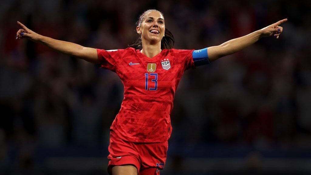 LYON, FRANCE - JULY 02:  (EDITORS NOTE - This image has been digitally filtered)  Alex Morgan of the USA celebrates her sides second goal during the 2019 FIFA Women's World Cup France Semi Final match between England and USA at Stade de Lyon on July 02, 2019 in Lyon, France. (Photo by Naomi Baker - FIFA/FIFA via Getty Images)
