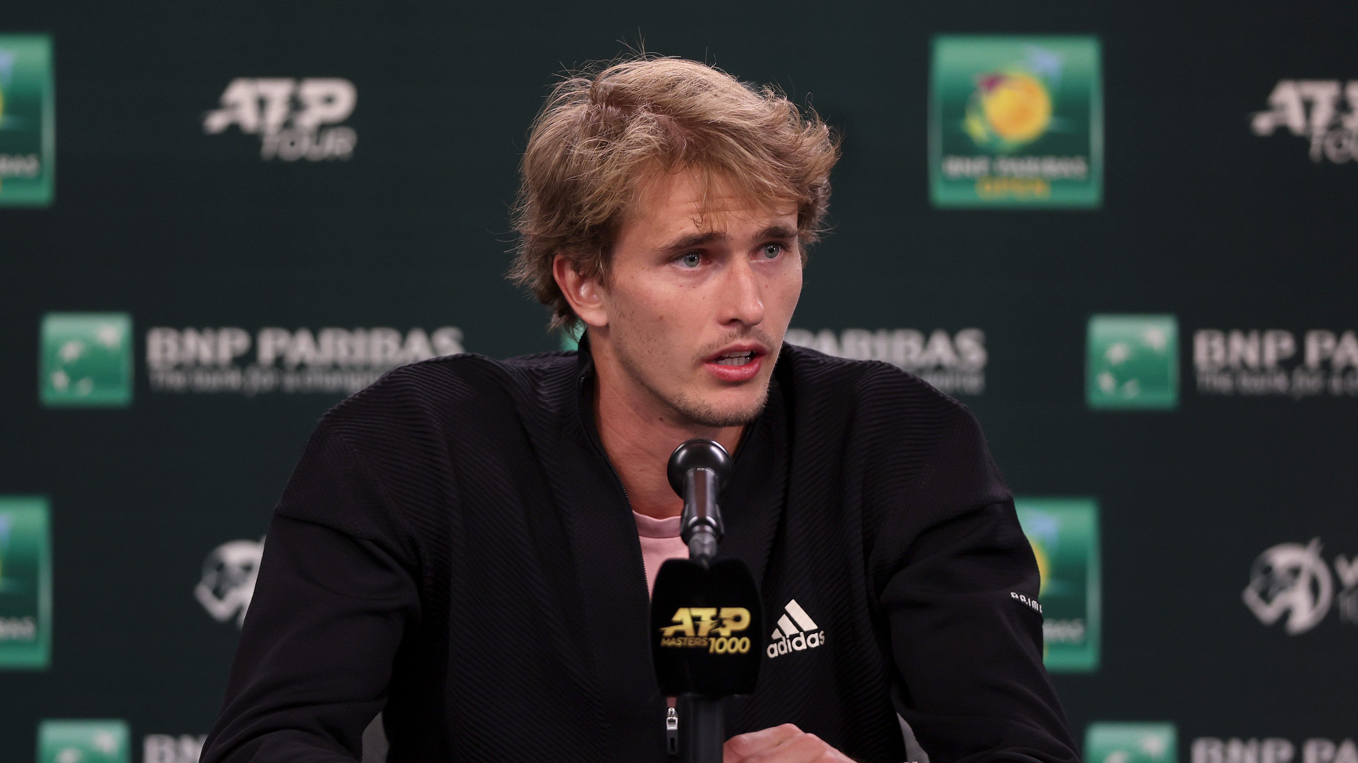 INDIAN WELLS, CALIFORNIA - MARCH 09: Alexander Zverev of Germany fields questions from the media during the BNP Paribas Open at the Indian Wells Tennis Garden on March 09, 2022 in Indian Wells, California. (Photo by Matthew Stockman/Getty Images)