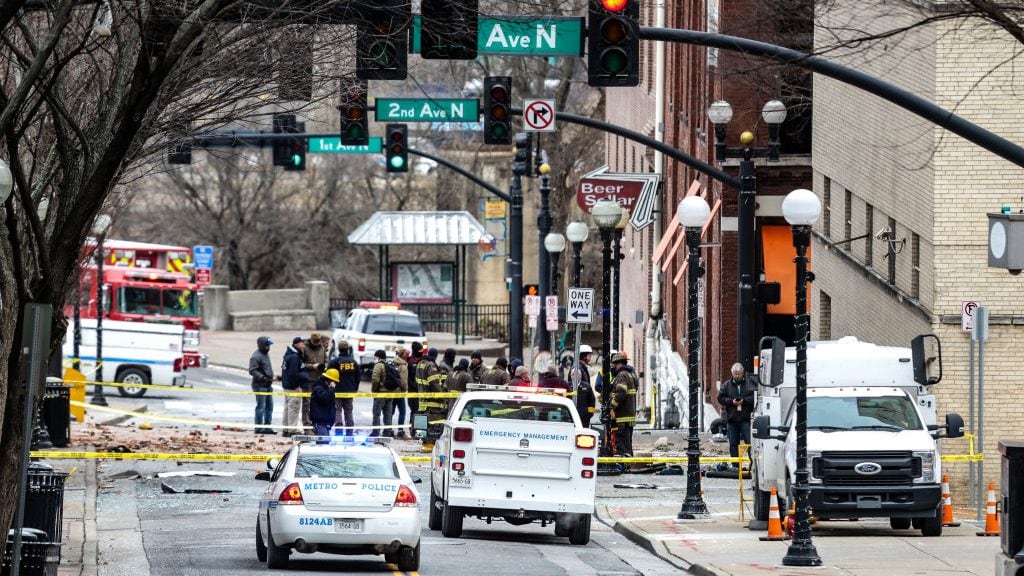 NASHVILLE, TN - DECEMBER 25: FBI and first responders work on the scene after an explosion on December 25, 2020 in Nashville, Tennessee. According to initial reports, a vehicle exploded downtown in the early morning hours. (Photo by Thaddaeus McAdams/Getty Images)