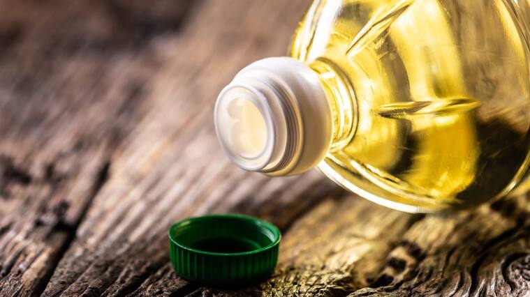 Olive, Sunflower or rapeseed oil in a plastic bottle, detail on the cap.