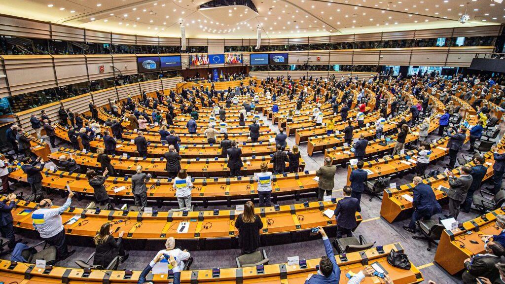 Parliament members give a standing ovation after a live video address of Ukrainian President Volodymyr Oleksandrovytsj Zelensky, during an extraordinary plenary session of the European parliament on Russian invasion of Ukraine, in Brussels, on March 1, 2022. - Zelensky called in a live video address to the European Parliament for the EU to "prove" it is with Ukraine as it resists Russia's invasion. - Belgium OUT (Photo by JONAS ROOSENS / BELGA / AFP) / Belgium OUT (Photo by JONAS ROOSENS/BELGA/AFP via Getty Images)