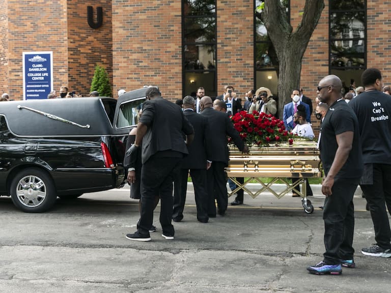 MINNEAPOLIS, USA - JUNE 04: George Floyd&#039;s casket is wheeled to a hearse after the first of three memorial services for him on June 4, 2020 at Trask Worship Center at North Central University in Minneapolis, Minnesota, United States. Hundreds of mourners Thursday attended the first of several memorials for George Floyd â an unarmed, handcuffed black man who was killed in police custody late last month. The service at North Central University in Minneapolis, Minnesota, was attended by Floyd&#039;s family and Ben Crump, the civil rights attorney representing the family, and celebrity guests. (Photo by Jordan Strowder/Anadolu Agency via Getty Images)