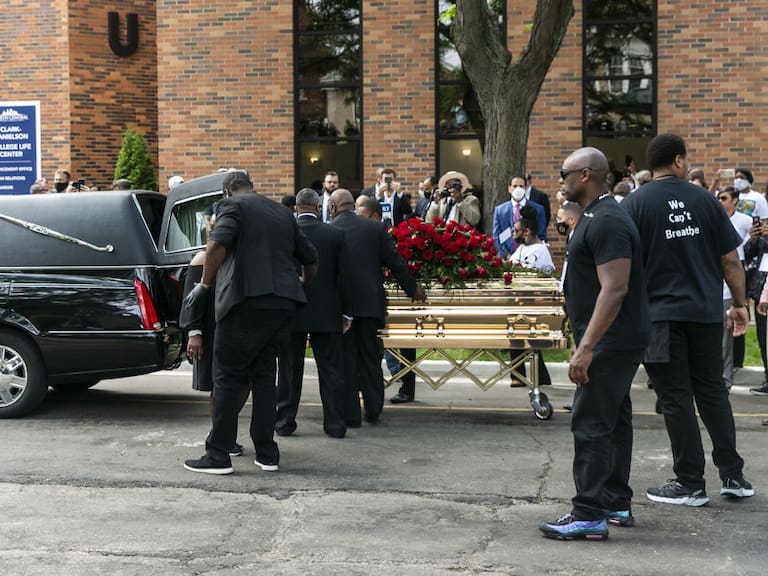 MINNEAPOLIS, USA - JUNE 04: George Floyd's casket is wheeled to a hearse after the first of three memorial services for him on June 4, 2020 at Trask Worship Center at North Central University in Minneapolis, Minnesota, United States. Hundreds of mourners Thursday attended the first of several memorials for George Floyd â an unarmed, handcuffed black man who was killed in police custody late last month. The service at North Central University in Minneapolis, Minnesota, was attended by Floyd's family and Ben Crump, the civil rights attorney representing the family, and celebrity guests. (Photo by Jordan Strowder/Anadolu Agency via Getty Images)