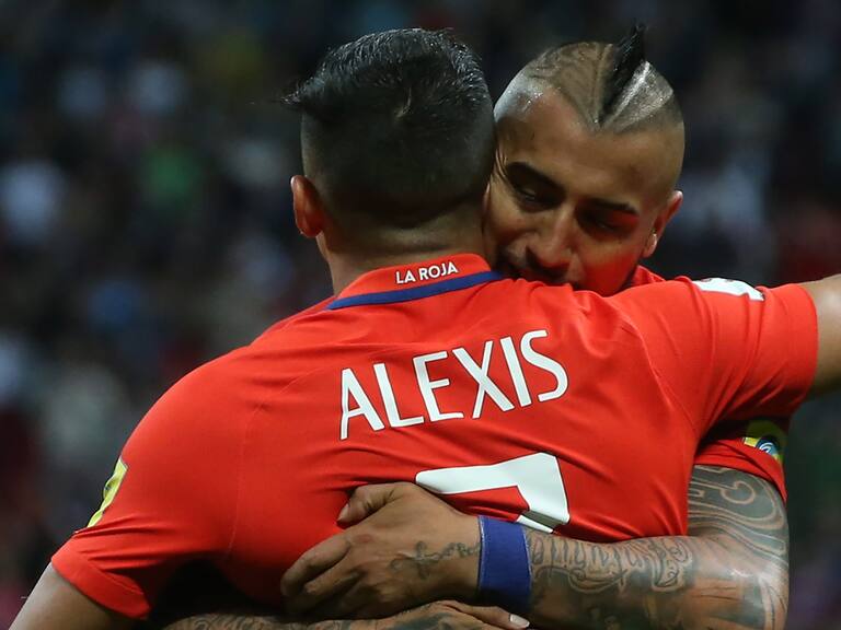 KAZAN, RUSSIA - JUNE 22, 2017: Chile's Alexis Sanchez (front) and Arturo Vidal embrace in the 2017 FIFA Confederations Cup Group B football match against Germany at Kazan Arena Stadium. The game ended in a 1-1 draw. Stanislav Krasilnikov/TASS (Photo by Stanislav KrasilnikovTASS via Getty Images)