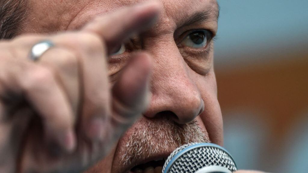 Turkish President Recep Tayyip Erdogan gestures as he delivers a speech during a rally on March 26, 2017 in Istanbul. - Turkish President Recep Tayyip Erdogan on March 26 lashed out again in the diplomatic row with the European Union saying it would be "easier" if the EU just rejected Turkey's bid to join the bloc. (Photo by OZAN KOSE / AFP) (Photo by OZAN KOSE/AFP via Getty Images)