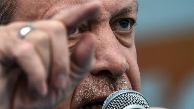 Turkish President Recep Tayyip Erdogan gestures as he delivers a speech during a rally on March 26, 2017 in Istanbul. - Turkish President Recep Tayyip Erdogan on March 26 lashed out again in the diplomatic row with the European Union saying it would be "easier" if the EU just rejected Turkey's bid to join the bloc. (Photo by OZAN KOSE / AFP) (Photo by OZAN KOSE/AFP via Getty Images)