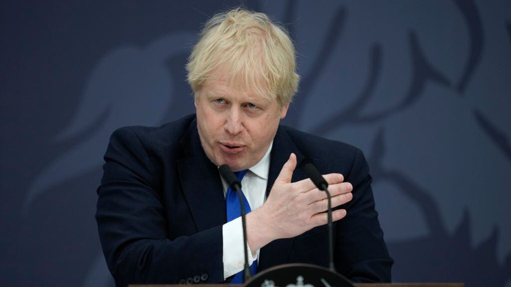 DOVER, ENGLAND - APRIL 14: Prime Minister Boris Johnson delivers a speech at Lydd Airport on April 14, 2022 in Dover, England. The UK government announced that they will process people seeking asylum in Britain 4,500 miles away in Rwanda in an effort to crack down on unauthorised migration. (Photo by Matt Dunham - WPA Pool/Getty Images)