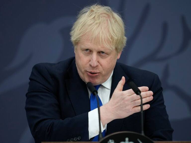 DOVER, ENGLAND - APRIL 14: Prime Minister Boris Johnson delivers a speech at Lydd Airport on April 14, 2022 in Dover, England. The UK government announced that they will process people seeking asylum in Britain 4,500 miles away in Rwanda in an effort to crack down on unauthorised migration. (Photo by Matt Dunham - WPA Pool/Getty Images)