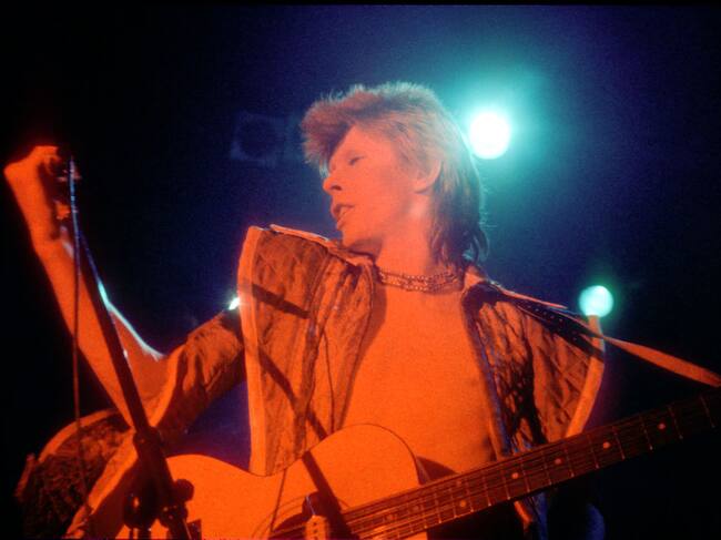 LOS ANGELES - 1973: Musician David Bowie performs onstage during his "Ziggy Stardust" era in 1973 in Los Angeles, California. (Photo by Michael Ochs Archives/Getty Images)