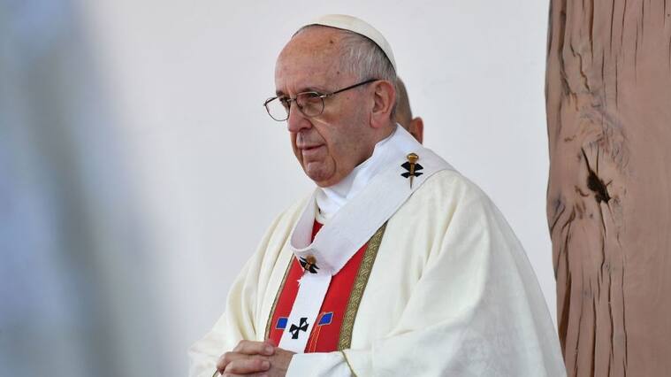 Pope Francis celebrates an open-air mass at Maquehue airport in Temuco, 800 km south of Santiago, on January 17, 2018. - Pope Francis arrived in the heartland of the Mapuche, Chile's largest indigenous group, which complains of discrimination and abuse and is seeking the return of ancestral lands now in private hands. The visiting Pontiff will pay a short visit to Temuco to make direct contact with Mapuche leaders after presiding over a huge open air mass. (Photo by Vincenzo PINTO and - / AFP) (Photo by VINCENZO PINTO/AFP via Getty Images)