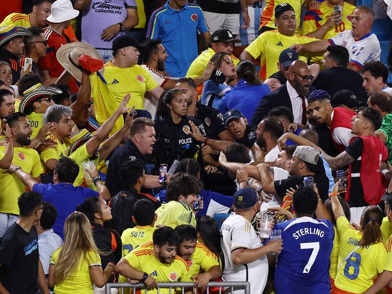 CHARLOTTE, NORTH CAROLINA - JULY 10: Fans of Colombia fights with fans of Uruguay during the CONMEBOL Copa America 2024 semifinal match between Uruguay and Colombia at Bank of America Stadium on July 10, 2024 in Charlotte, North Carolina. (Photo by Tim Nwachukwu/Getty Images)