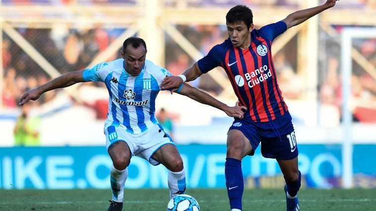 BUENOS AIRES, ARGENTINA - FEBRUARY 22: Marcelo Diaz of Racing Club fights for the ball with Oscar Romero of San Lorenzo during a match between San Lorenzo and Racing Club as part of Superliga 2019/20 at Estadio Pedro Bidegain on February 22, 2020 in Buenos Aires, Argentina. (Photo by Rodrigo Valle/Getty Images)