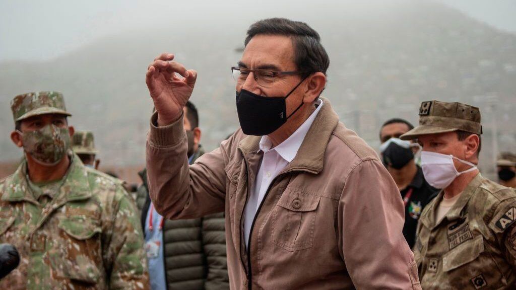 Peru's President Martin Vizcarra speaks to media before an operation to distribute essential products among those in need amid the COVID-19 novel coronavirus pandemic, in Villa Maria del Triunfo, on the southern outskirts of Lima, on September 15, 2020. - Vizcarra pushed back against his opponents on Monday days ahead of an impeachment vote, accusing Congress chief Manuel Merino of "conspiracy" by trying to secure military assurances for a bid to succeed him.Congress voted late Friday to open impeachment proceedings against Vizcarra for "moral incapacity" over accusations he incited aides to lie to anti-graft investigators. (Photo by Ernesto BENAVIDES / AFP) (Photo by ERNESTO BENAVIDES/AFP via Getty Images)