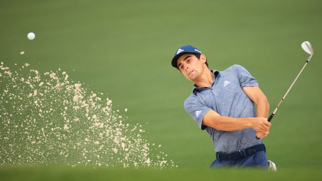 AUGUSTA, GEORGIA - APRIL 10: Joaquin Niemann of Chile plays a shot from a bunker on the second hole during the third round of the Masters at Augusta National Golf Club on April 10, 2021 in Augusta, Georgia. (Photo by Mike Ehrmann/Getty Images)
