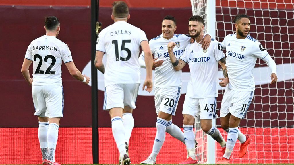 LIVERPOOL, ENGLAND - SEPTEMBER 12: Mateusz Klich of Leeds United celebrates with teammates after scoring his team's third goal during the Premier League match between Liverpool and Leeds United at Anfield on September 12, 2020 in Liverpool, England. (Photo by Shaun Botterill/Getty Images)