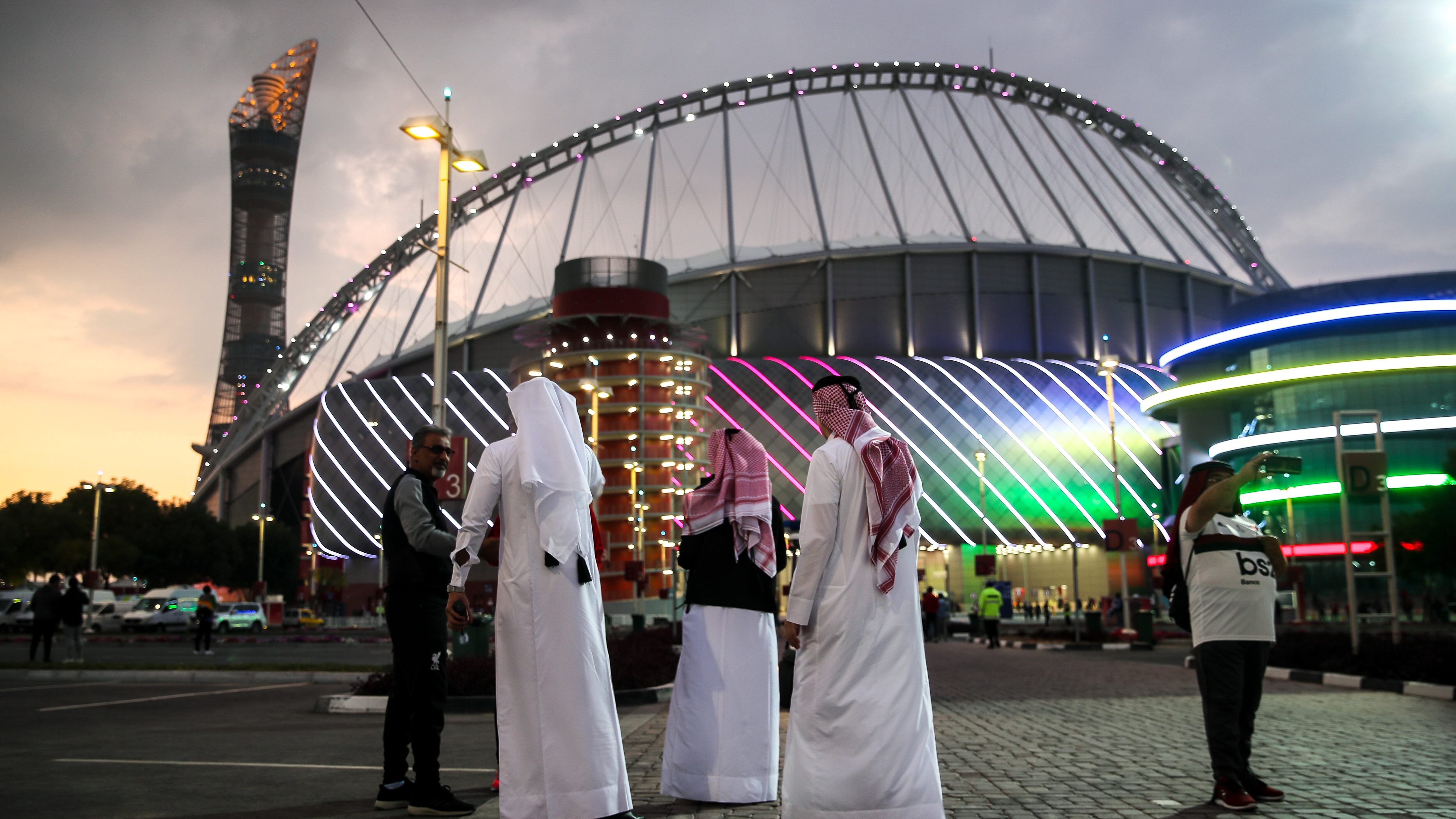 DOHA, QATAR - DECEMBER 21: A general external view of Khalifa International Stadium, host venue of FIFA World Cup Qatar 2022 at dusk as locals wait around prior to the FIFA Club World Cup Qatar 2019 Third Place Play Off match between Monterrey and Al Halil FC at Khalifa International Stadium on December 21, 2019 in Doha, Qatar. (Photo by Matthew Ashton - AMA/Getty Images)
