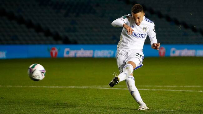 LEEDS, ENGLAND - SEPTEMBER 16: Rodrigo Moreno of Leeds United scores his sides first penalty during the Carabao Cup Second Round match between Leeds United and Hull City at Elland Road on September 16, 2020 in Leeds, England. (Photo by Phil Noble - Pool/Getty Images)