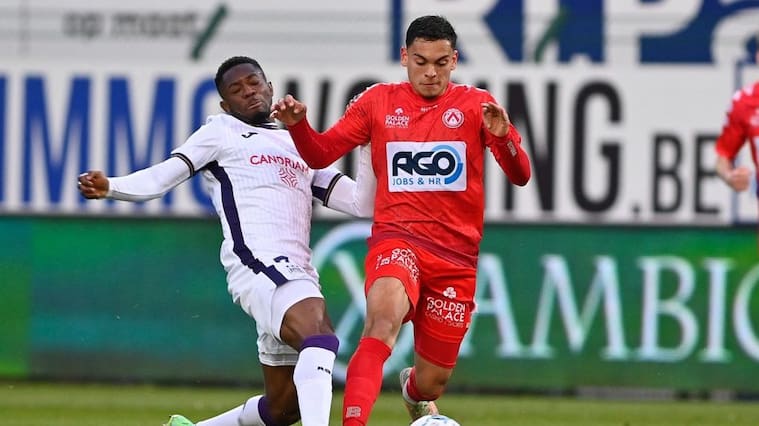 Anderlecht's Francis Amuzu and Kortrijk's Nayel Mehssatou fight for the ball during a soccer match between KV Kortrijk and RSC Anderlecht, Sunday 10 April 2022 in Kortrijk, on day 34 of the 'Jupiler Pro League' first division of the Belgian championship. BELGA PHOTO DAVID CATRY (Photo by DAVID CATRY / BELGA MAG / Belga via AFP) (Photo by DAVID CATRY/BELGA MAG/AFP via Getty Images)