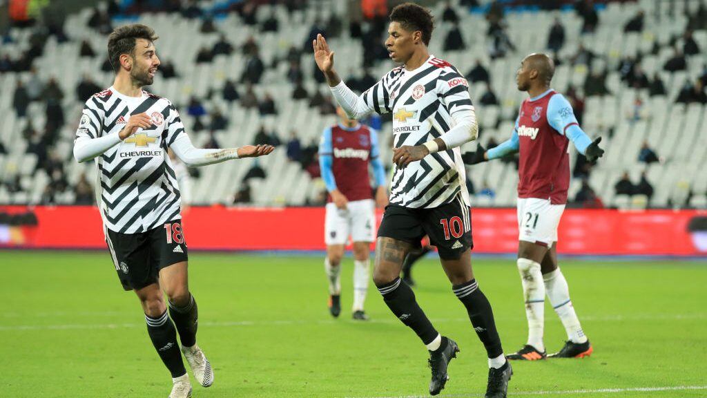 Manchester United's Marcus Rashford (right) celebrates scoring his side's third goal of the game during the Premier League match at The London Stadium, London. (Photo by Adam Davy/PA Images via Getty Images)