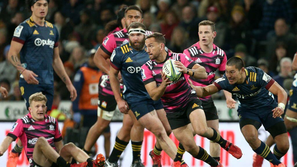 DUNEDIN, NEW ZEALAND - JUNE 13: Aaron Cruden of the Chiefs makes a break during the round 1 Super Rugby Aotearoa match between the Highlanders and Chiefs at Forsyth Barr Stadium on June 13, 2020 in Dunedin, New Zealand. (Photo by Dianne Manson/Getty Images)