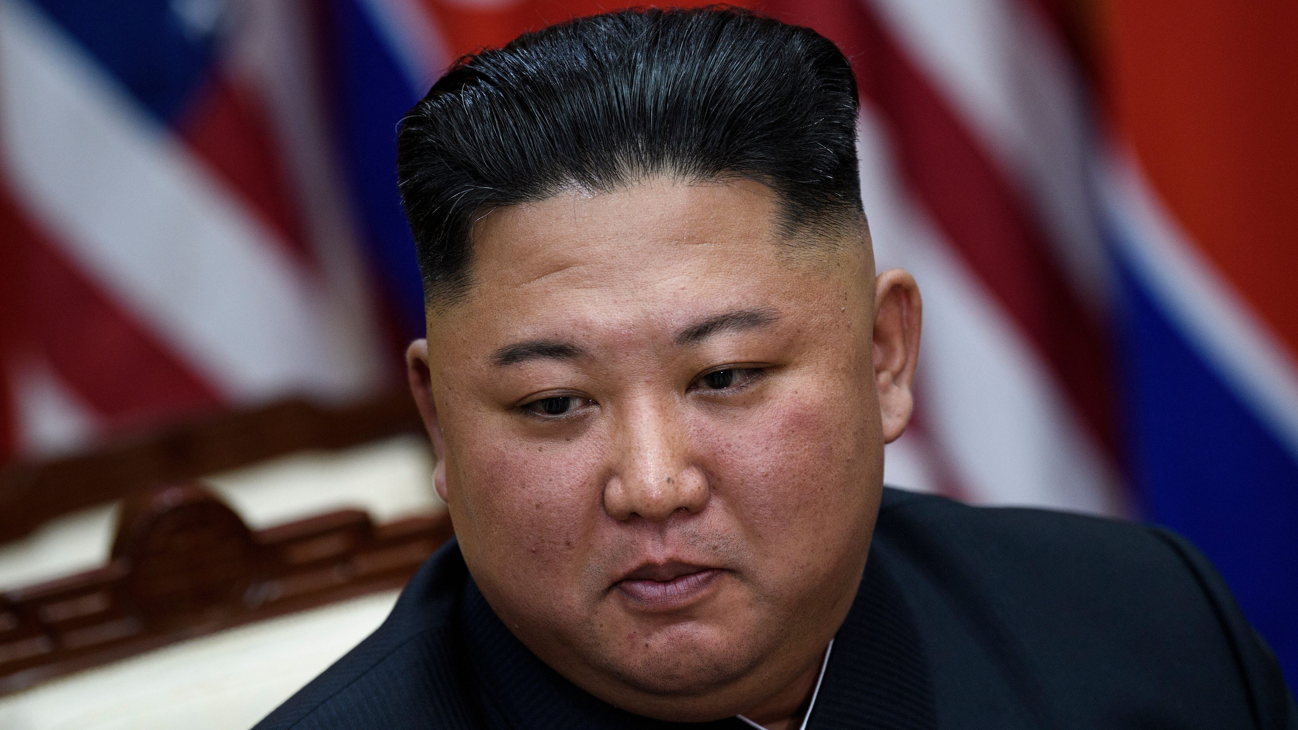 TOPSHOT - North Korea's leader Kim Jong Un before a meeting with  US President Donald Trump on the south side of the Military Demarcation Line that divides North and South Korea, in the Joint Security Area (JSA) of Panmunjom in the Demilitarized zone (DMZ) on June 30, 2019. (Photo by Brendan Smialowski / AFP)        (Photo credit should read BRENDAN SMIALOWSKI/AFP via Getty Images)