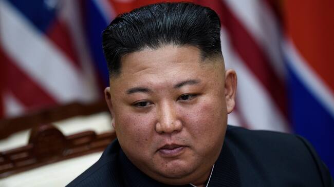 TOPSHOT - North Korea's leader Kim Jong Un before a meeting with US President Donald Trump on the south side of the Military Demarcation Line that divides North and South Korea, in the Joint Security Area (JSA) of Panmunjom in the Demilitarized zone (DMZ) on June 30, 2019. (Photo by Brendan Smialowski / AFP) (Photo credit should read BRENDAN SMIALOWSKI/AFP via Getty Images)