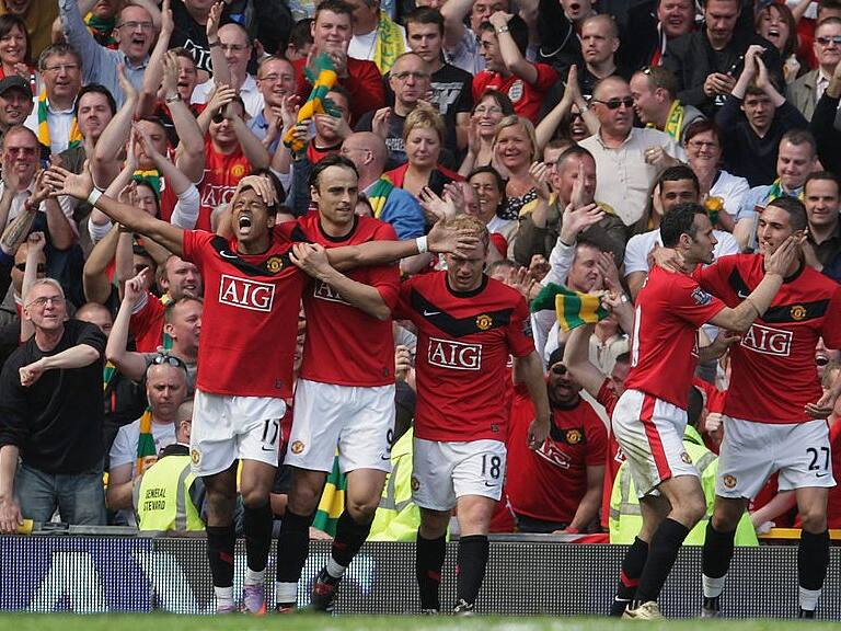 MANCHESTER, ENGLAND - APRIL 24: Nani of Manchester United celebrates scoring their second goal during the Barclays Premier League match between Manchester United and Tottenham Hotspur at Old Trafford on April 24 2010 in Manchester, England. (Photo by John Peters/Manchester United via Getty Images)