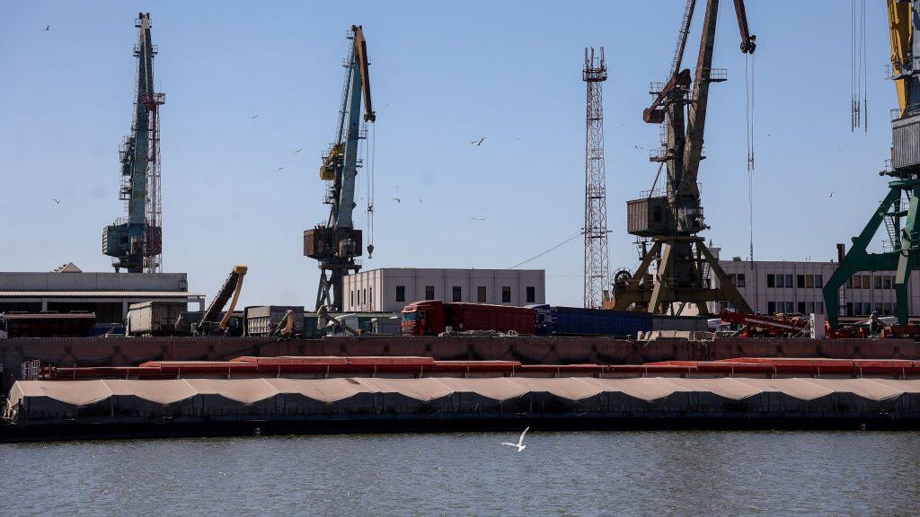 Grain carriers wait to reload its cargo to barges at Reni river port on Danube river, in Odesa region, Ukraine, July 21, 2022. (Photo by Sergii Kharchenko/NurPhoto via Getty Images)