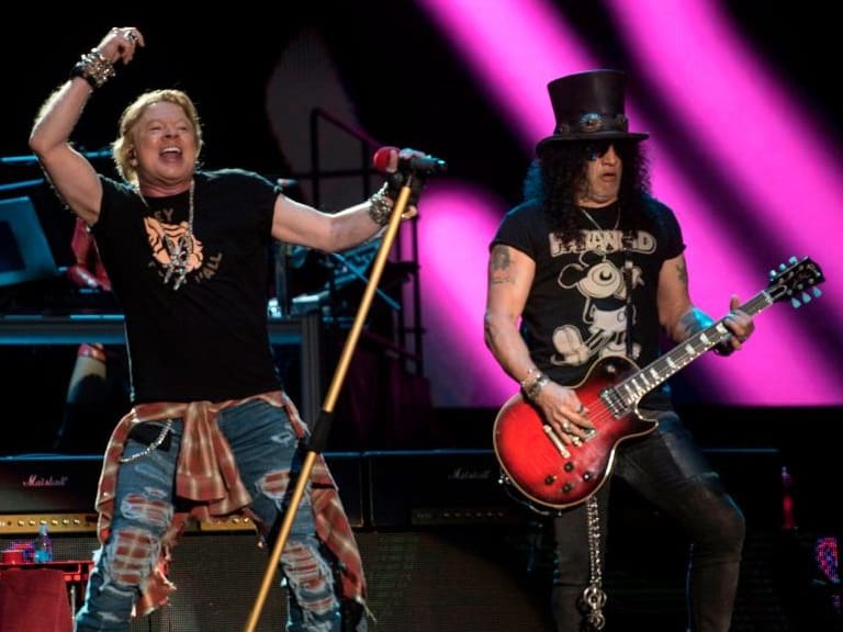 Axl Rose (L) and Slash of the band &quot;Guns N´ Roses&quot; perform during the Vive Latino 2020 festival at the Foro Sol in Mexico City, on March 14, 2020. - The festival is carried out with extreme health measures to avoid the spread of the coronavirus, COVID-19. (Photo by Alejandro MELENDEZ / AFP) (Photo by ALEJANDRO MELENDEZ/AFP via Getty Images)