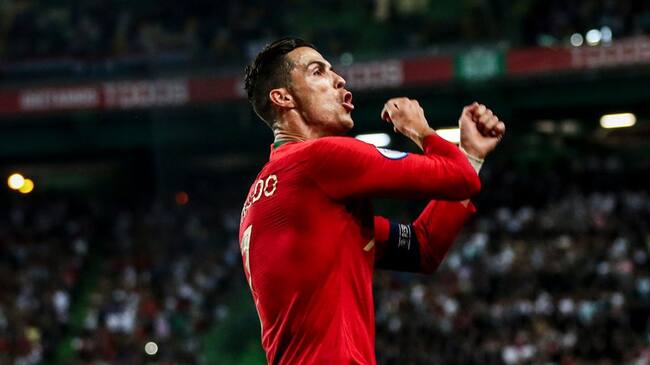 Portugal's forward Cristiano Ronaldo celebrates after scoring a goal during the Euro 2020 qualifier group B football match between Portugal and Luxembourg at the Jose Alvalade stadium in Lisbon on October 11, 2019. (Photo by CARLOS COSTA / AFP) (Photo by CARLOS COSTA/AFP via Getty Images)