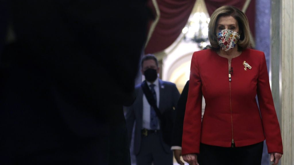 WASHINGTON, DC - JANUARY 08: U.S. Speaker Rep. Nancy Pelosi (D-CA) walks in a hallway at the U.S. Capitol January 8, 2021 in Washington, DC. Speaker Pelosi and her leadership team are considering an impeachment process of President Donald Trump after pro-Trump mobs stormed the Capitol and temporarily stopped the process the certification for President-elect Joe Biden and Vice President-elect Kamala Harris’ electoral college win. (Photo by Alex Wong/Getty Images)