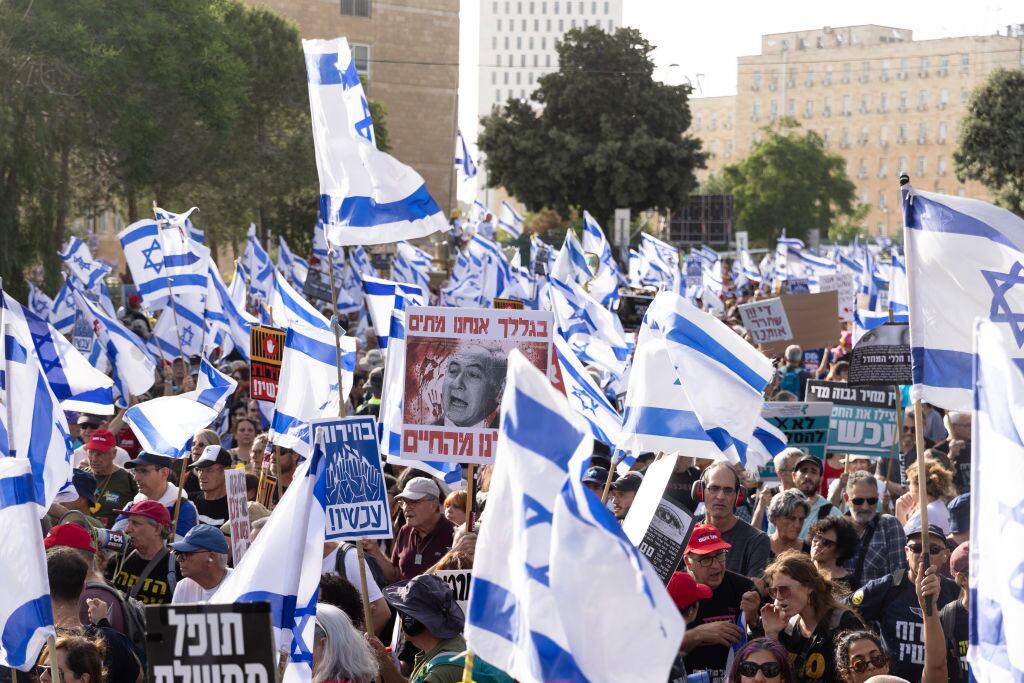JERUSALEM - MAY 20: Protesters call for a hostages deal and denounce Israeli Prime Minister Benjamin Netanyahu and the government on May 20, 2024 in Jerusalem. As the Israeli government reconvenes after a month-long recess, anti-government protesters and supporters of those kidnapped by Hamas on October 7, 2023 continue their demonstrations. (Photo by Amir Levy/Getty Images)