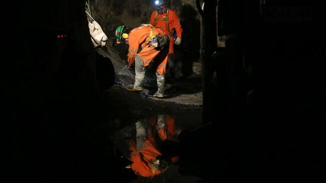 Miners work at "El Teniente" copper mine in the Andes mountains in Rancagua, Chile, some 140 kilometers southeast of Santiago, on March 21, 2018. "El Teniente" is the world's largest underground copper mine and produced 475,000 tons of copper in 2016. After 113 years of operations and the construction of 4.500 km of tunnels, the state-run mine seeks to extend its life by another five decades.
/ AFP PHOTO / CLAUDIO REYES (Photo credit should read CLAUDIO REYES/AFP via Getty Images)